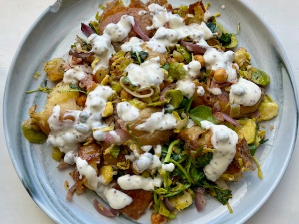 Smashed potato and leek salad with caper dressing